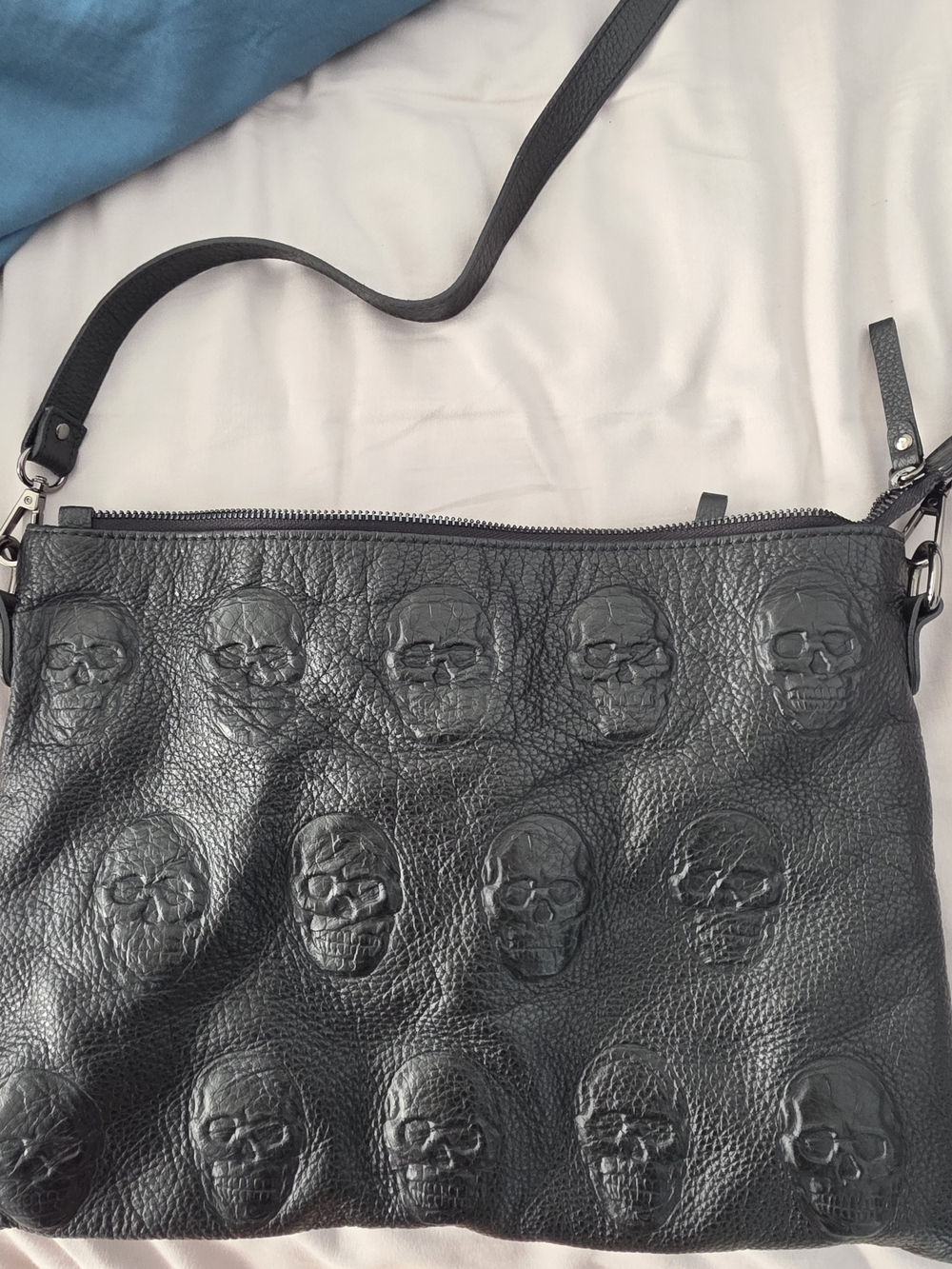 IO pelle Black Embossed Skull Leather Crossbody Bag